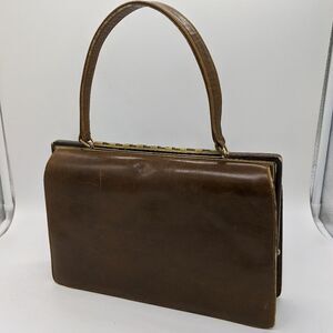 Bags by Nicholas Reich Brown vintage snap lock closure